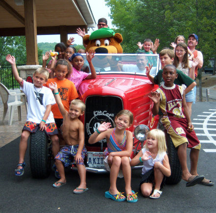 children and a car