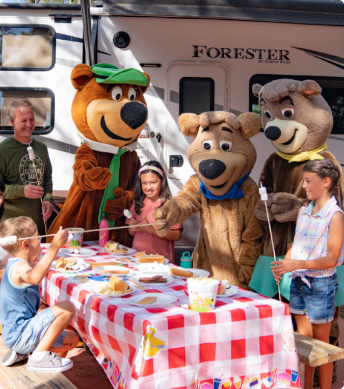 A table covered with a red and white checkered tablecloth