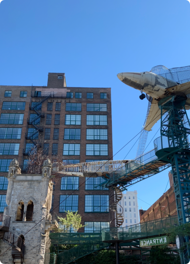 A large building topped with a plane
