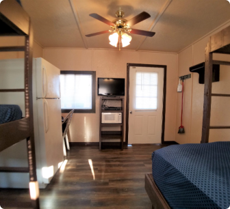 A bunk bed with a television