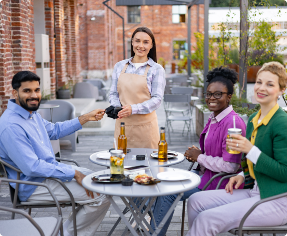 A group of people gathered around a table