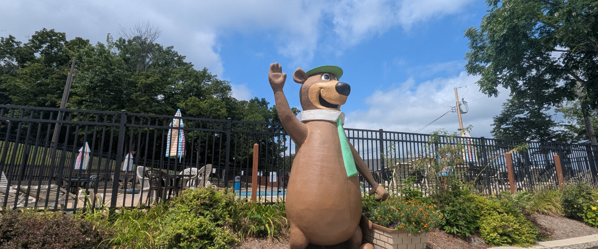 A cheerful dog statue adorned